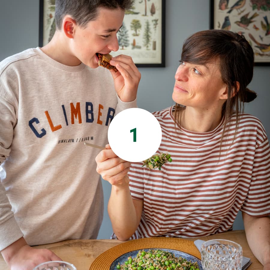 a family eating Humamy dishes